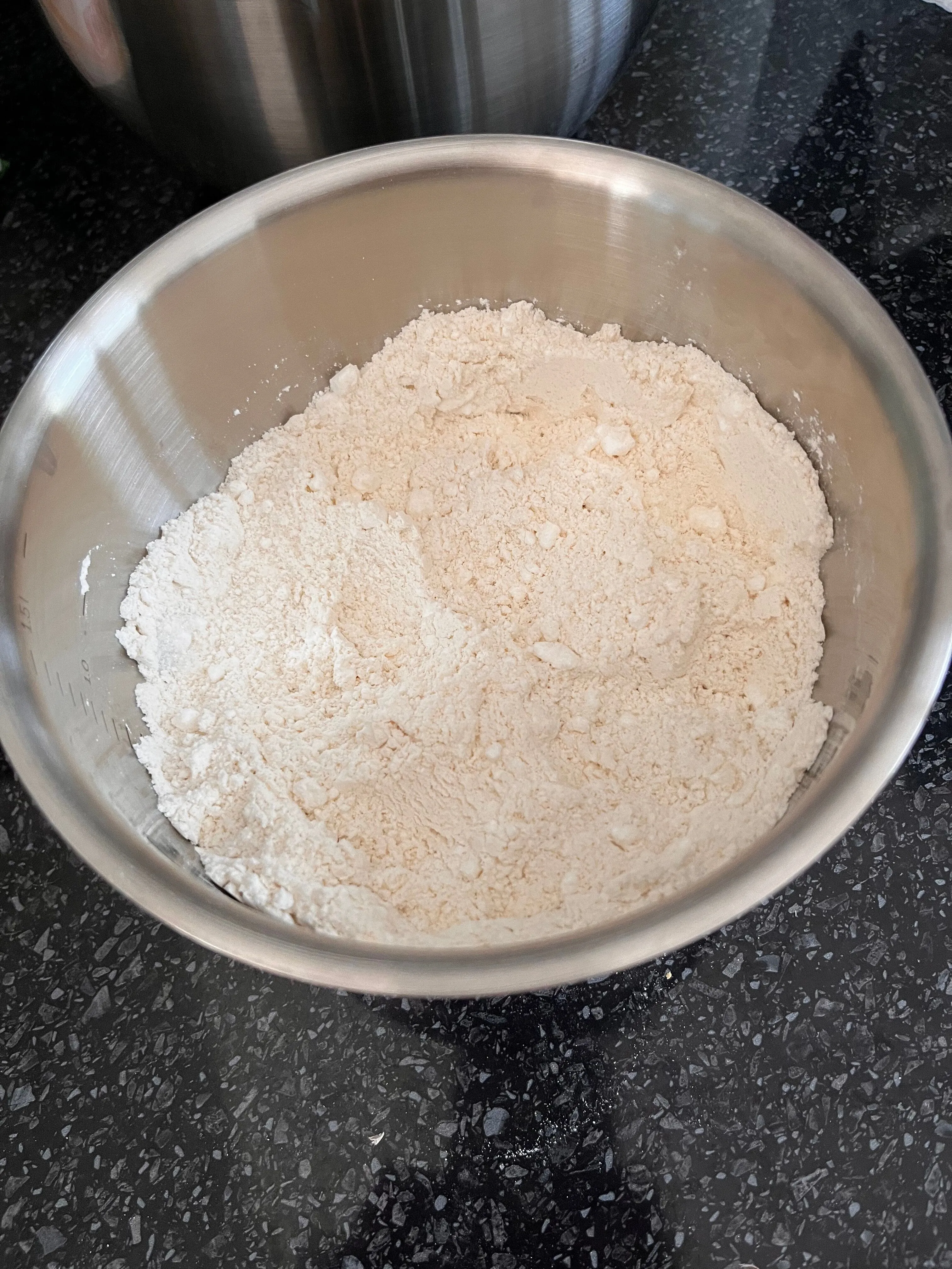 Plain flour and sugars combined in a second mixing bowl